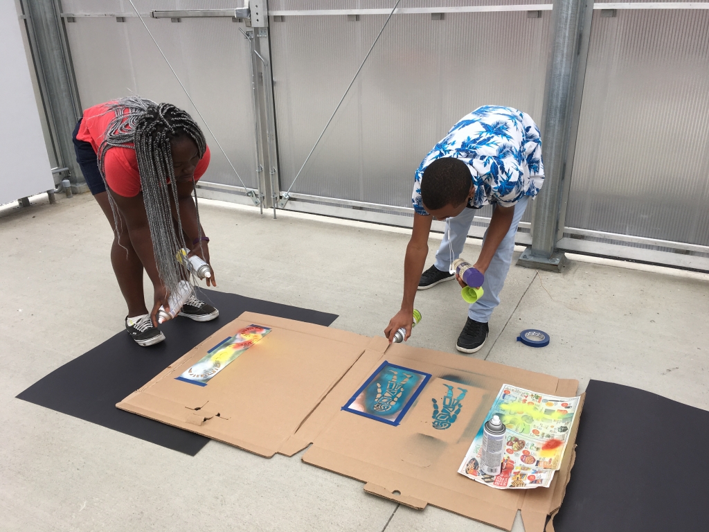 A stencil workshop lead by Pablo Youngs. Photo Anna Snyder