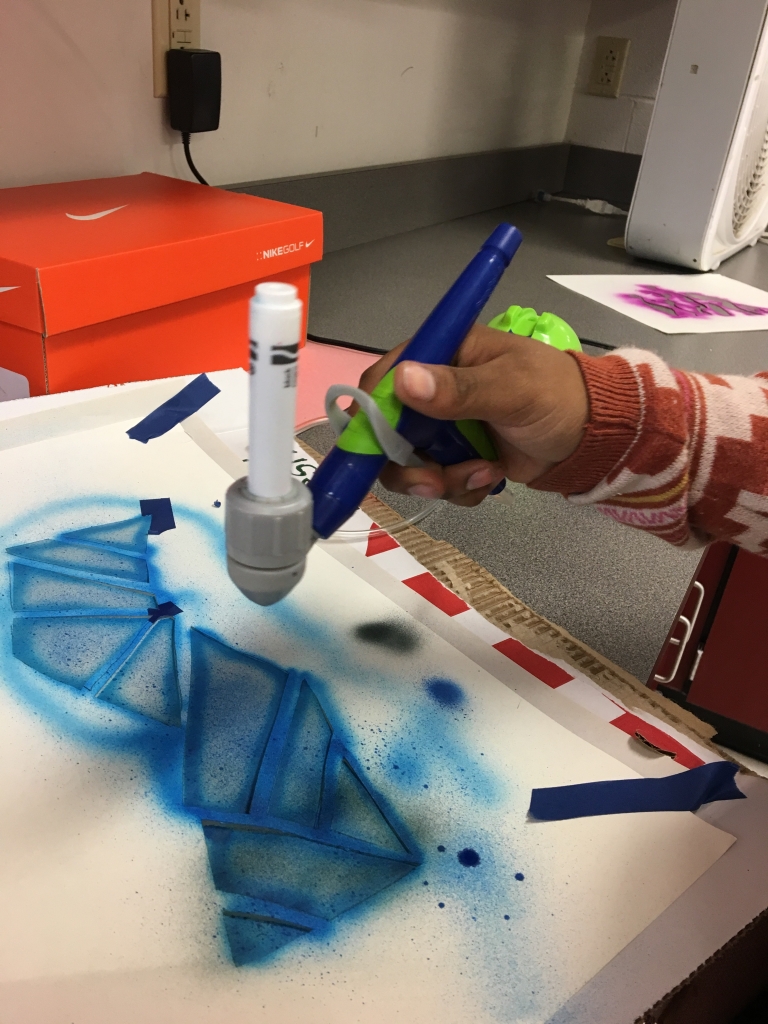 Stencil making close-up. Photo by Anna Snyder