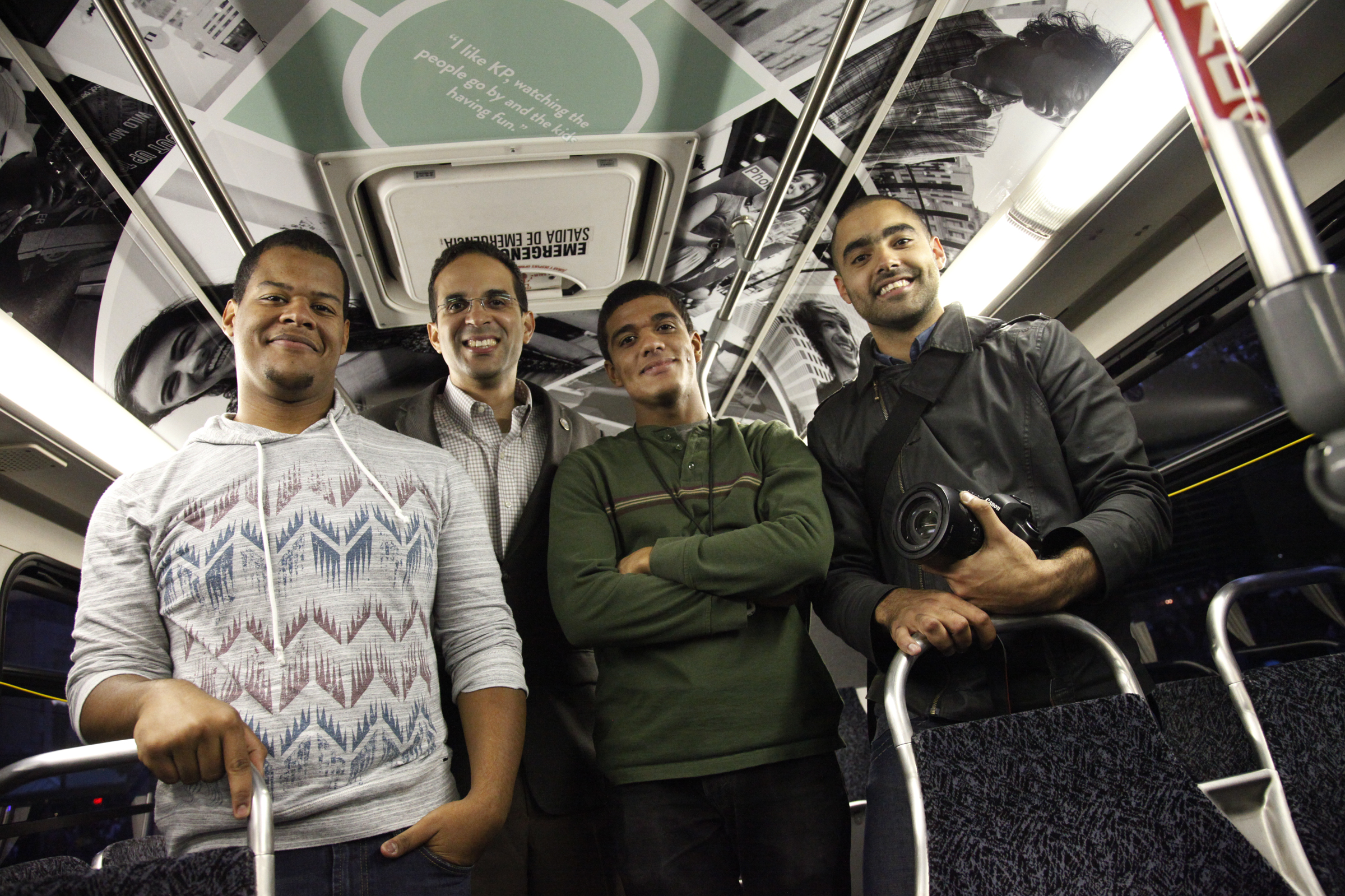 AS220 Youth photographed inside the newly wrapped bus with Providence Mayor Angel Taveras