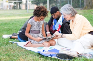 Reading together at Harriet & Sayles Park