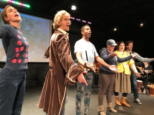 Adult actors performing in Olneyville the Operetta by students from the Manton Avenue Project