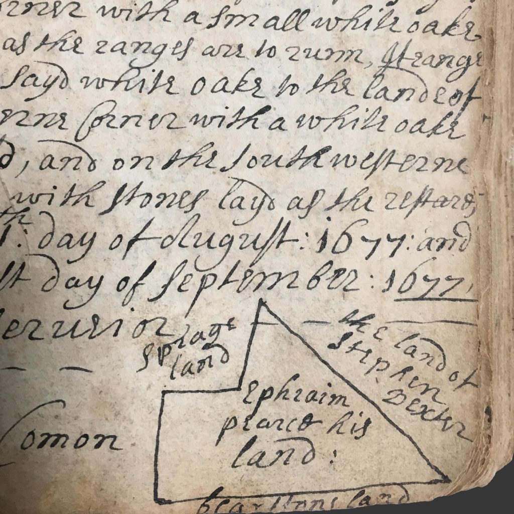 A map drawn on a page from the Providence Town Records 1677 reads: center: “Ephraim Pearce, his land,” right: “the land of Stephen Dexter.”