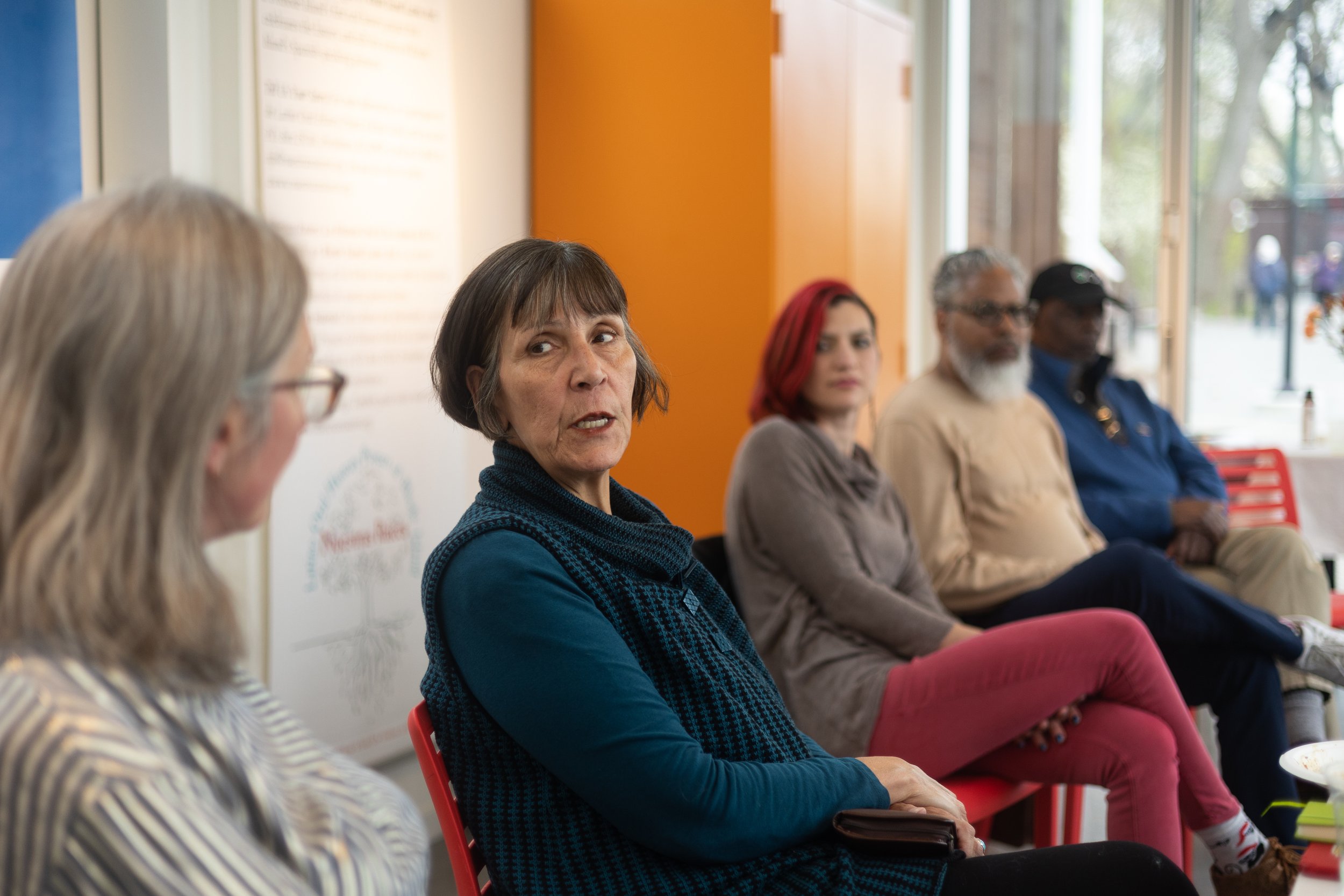 photo of people during a broad street stories meeting