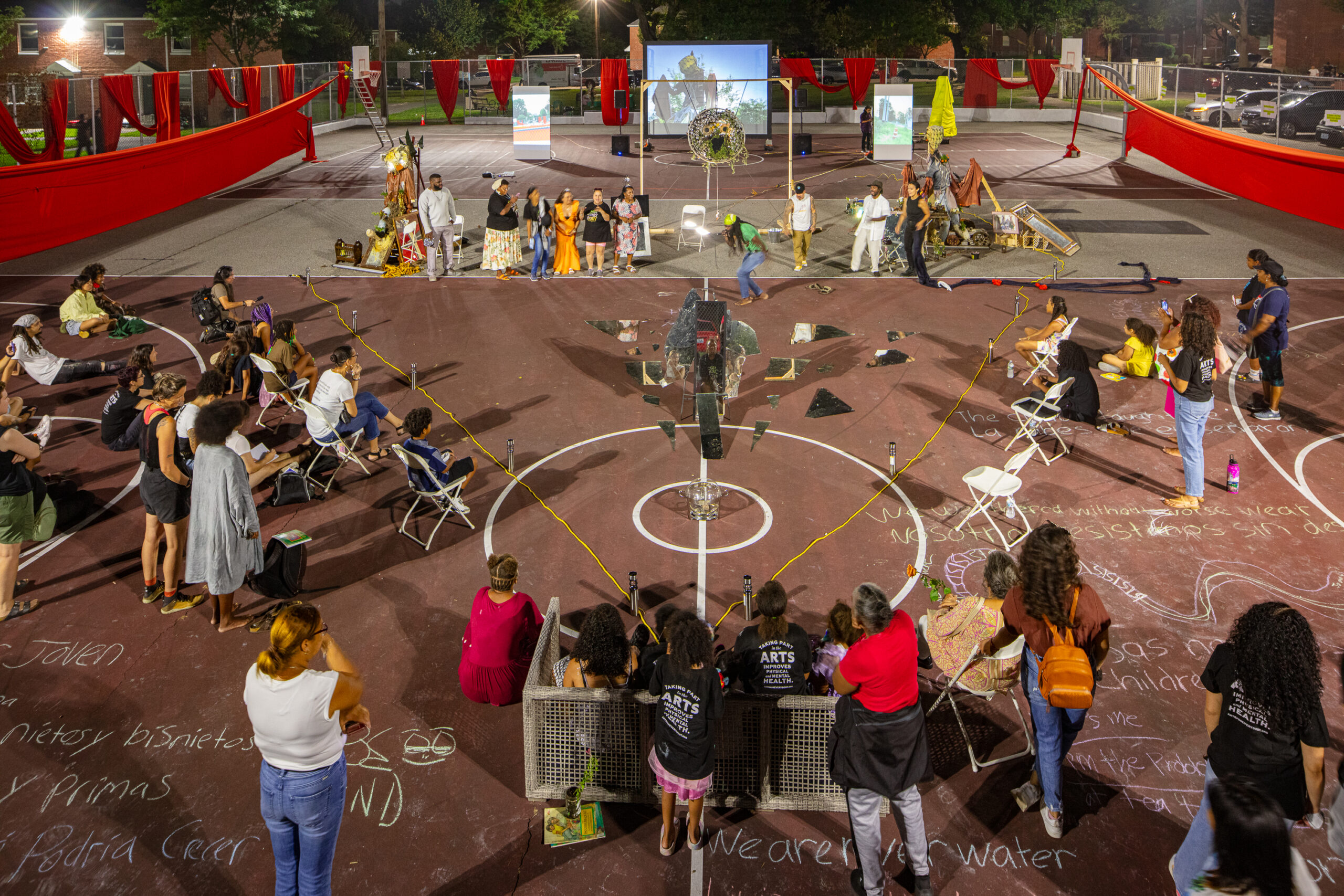 photo of people enjoying an artistic performance
